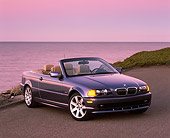 AUT 01 RK0098 01
2001 BMW 323Ci Convertible Blue 3/4 Front View On Pavement By Water Filtered