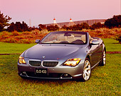 AUT 01 RK0213 02
2005 BMW 645Ci Convertible Blue 3/4 Front View On Grass Filtered