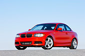 AUT 01 RK0328 01
2008 BMW 135i Red 3/4 Front View Blue Sky