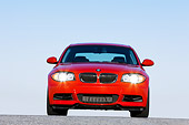 AUT 01 RK0329 01
2008 BMW 135i Red Head On View Blue Sky