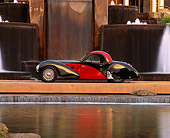 AUT 02 RK0020 01
1937 Bugatti Atalante Type 57SC Coupe Black And Red Profile By Water Fountain