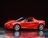 AUT 04 RK0050 04
1999 Lotus Elise Sport 190 Red 3/4 Side View On Mylar Floor Studio
