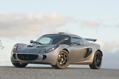 AUT 04 RK0129 01
2006 Lotus Exige Silver 3/4 Front View On Pavement Blue Sky
