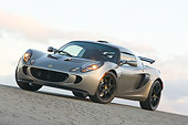 AUT 04 RK0130 01
2006 Lotus Exige Silver 3/4 Front View On Pavement Blue Sky