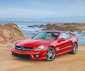 AUT 05 RK0618 01
2010 Mercedes-Benz SL500 Convertible Red 3/4 Front View On Beach