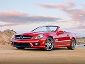 AUT 05 RK0619 01
2010 Mercedes-Benz SL500 Convertible Red 3/4 Front View On Beach