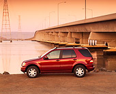 AUT 05 RK0175 01
2000 Mercedes Benz ML430 Burgundy Profile By Bridge And Water