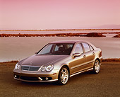 AUT 05 RK0373 03
2005 Mercedes C55 AMG Sports Sedan Silver 3/4 Front View By Water