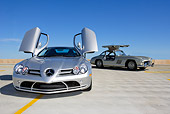 AUT 05 RK0442 01
Mercedes-Benz 2005 SLR McLaren Silver 1956 300SL Doors Open On Pavement