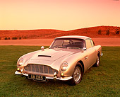 AUT 06 RK0011 02
1964 Aston Martin DB5 Silver Front 3/4 View On Grass By Hills Filtered