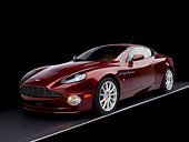 AUT 06 RK0088 02
2006 Aston Martin V12 Vanquish S Merlot Red 3/4 Front View Studio