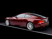 AUT 06 RK0089 01
2006 Aston Martin V12 Vanquish S Merlot Red 3/4 Rear View Studio