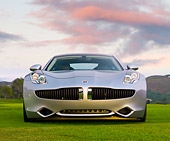 AUT 09 RK1174 01
2010 Fisker Karma Hybrid Silver Front View On Grass