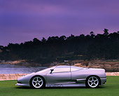 AUT 09 RK0187 01
BMW Ital Design Nazca Concept Car Silver Profile View On Grass Gray Sky By Water