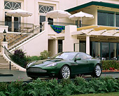 AUT 09 RK0203 01
Aston Martin Vantage Green Concept Car 3/4 Front View In Front Of The Lodge