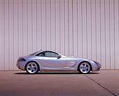 AUT 09 RK0274 02
Mercedes-Benz Vision SLR Silver Profile On Pavement Against Wall