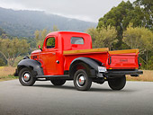 AUT 14 RK1622 01
1939 Plymouth PT-81 Pickup Truck Red And Black 3/4 Rear View On Pavement By Trees And Fog