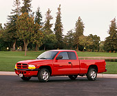 AUT 14 RK0019 03
1997 Dodge Dakota Sport Extended Cab Red 3/4 Side View On Pavement By Trees