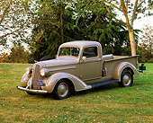 AUT 14 RK0507 01
1937 Dodge Pick Up Truck Brown 3/4 Side View On Grass Trees
