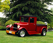 AUT 14 RK0680 01
1928 Chevy Pick Up Truck Burgundy 3/4 Side View On Grass By Trees
