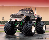 AUT 14 RK0825 31
1972 Chevrolet Monster Truck Skoal Bandit Black Front 3/4 Front View On Wet Pavement