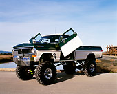 AUT 14 RK0841 03
1970 Ford F250 4x4 Gullwing Monster Truck 3/4 Front View Doors Open On Pavement