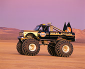 AUT 14 RK0851 03
1971 Chevrolet Monster Truck Gulf Oil Black And Gold 3/4 Front View In Desert At Dusk