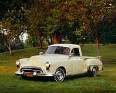 AUT 14 RK0994 01
1949 Oldsmobile Pickup Truck Beige 3/4 Front View On Grass By Trees