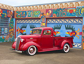 AUT 14 RK1503 01
1937 Chevrolet Pickup Truck Red 3/4 Front View On Pavement By Colorful Garage