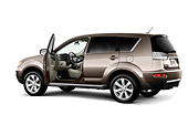 AUT 15 IZ0813 01
2010 Mitsubishi Outlander SUV Gold 3/4 Rear View On White Seamless