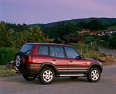 AUT 15 RK0219 03
1996 Toyota Rav 4 Burgundy Rear 3/4 View On Pavement Trees Background At Dusk