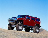 AUT 15 RK0647 03
2003 Hummer H2 Burgundy 3/4 Front View On Gravel