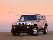 AUT 15 RK1159 01
2007 Hummer H3 Silver 3/4 Front View On Pavement At Dusk