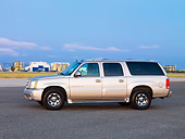 AUT 15 RK1201 01
2004 Cadillac Escalade Champagne 3/4 Front View Cloudy Sky