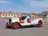 AUT 16 RK0153 01
1929 American LaFrance Triple Combination Fire Truck White 3/4 Front View By Building