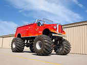 AUT 16 RK0169 01
1947 Mack Pumper Fire Engine Monster Truck Red 3/4 Front View On Pavement