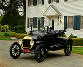 AUT 17 RK0042 05
1915 Ford Model T Roadster Black 3/4 Front View On Pavement By House
