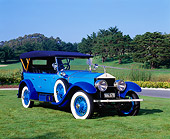 AUT 18 RK0061 02
1923 Rolls Royce Silver Ghost Blue 3/4 Front View On Grass Trees Blue Sky
