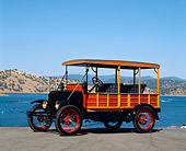 AUT 18 RK0283 01
1924 Ford Model T Depot Hack 3/4 Front View On Pavement By Lake Blue Sky