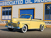 AUT 20 RK0509 01
1947 Ford Super Deluxe Convertible Yellow 3/4 Front View In Front Of Garage