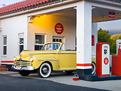 AUT 20 RK0512 01
1947 Ford Super Deluxe Convertible Yellow 3/4 Front View In Gas Station