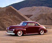AUT 20 RK0036 04
1948 Burgundy Ford Coupe 3/4 Front View On Dirt