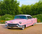 AUT 21 RK2539 01
1955 Cadillac Coupe de Ville Pink 3/4 Front View On Pavement By Trees