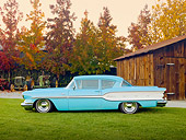 AUT 21 RK2600 01
1958 Pontiac Chieftain Turquoise Profile View On Grass By Barn