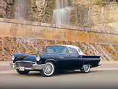 AUT 21 RK2655 01
1957 Ford Thunderbird Black 3/4 Front View On Pavement By Waterfall
