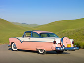 AUT 21 RK2679 01
1955 Ford Crown Victoria Pink And White 3/4 Rear View On Dirt Road By Grassy Hills