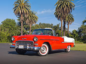 AUT 21 RK2706 01
1955 Chevrolet Bel Air Convertible Red And White 3/4 Front View On Pavement By Palm Trees