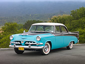 AUT 21 RK2719 01
1956 Dodge Royal Hardtop Blue, Black And White 3/4 Front View On Pavement By Trees And Fog