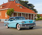 AUT 21 RK2744 01
1958 Buick Special Turquoise 3/4 Front View On Pavement By Brick Building