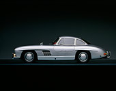 AUT 21 RK0116 01
1956 Mercedes Benz 300SL Gullwing Silver Profile On Gray Line Studio